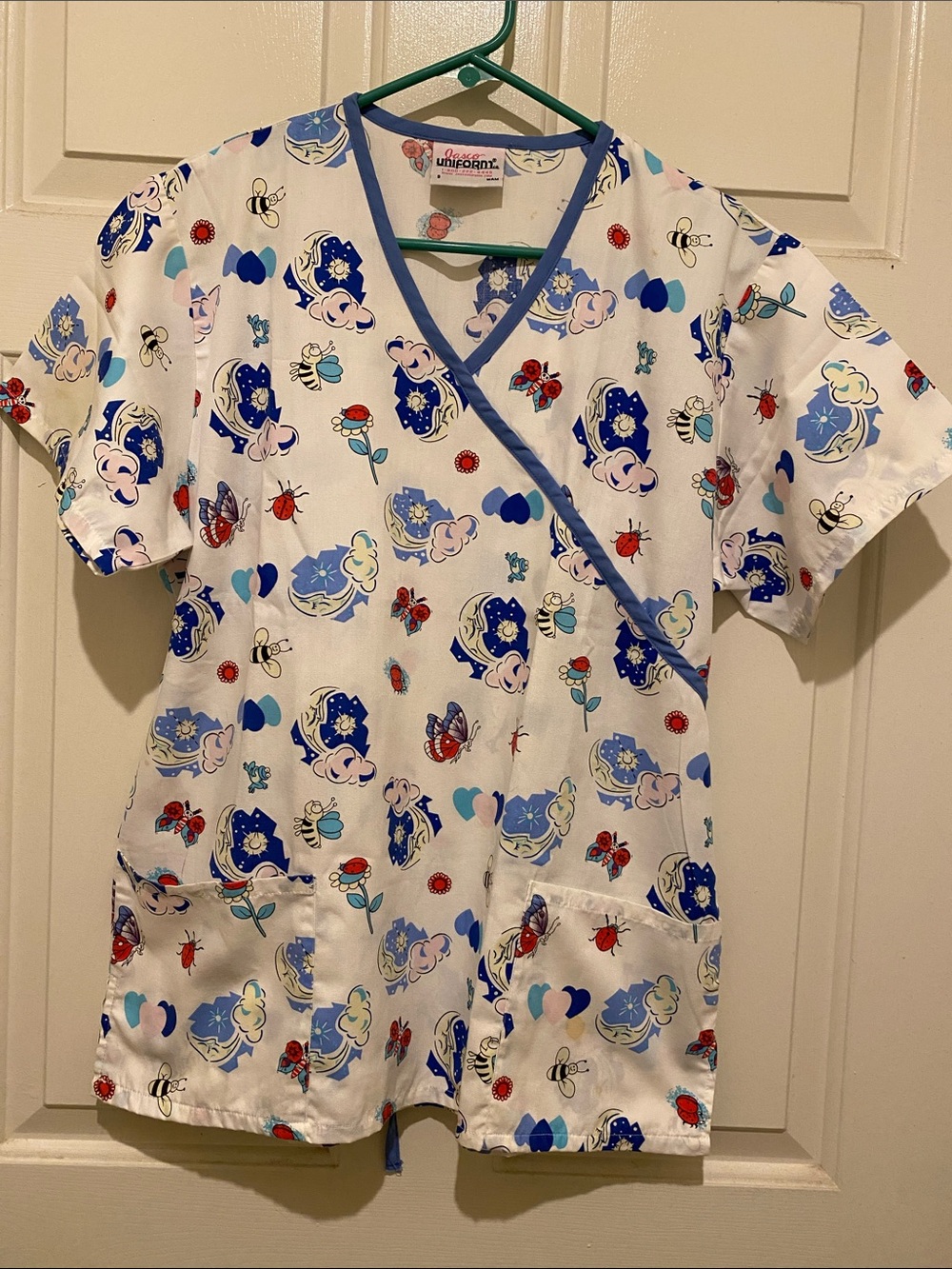 JascoUniform White Scrub Top with Blue Trim and Multicolor Bug & Floral Print